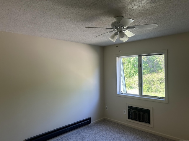 21 Oak Avenue Ext Unit 2, Torrington, CT 06790 - unfurnished room with a textured ceiling, a baseboard heating unit, a ceiling fan, carpet flooring, and baseboards