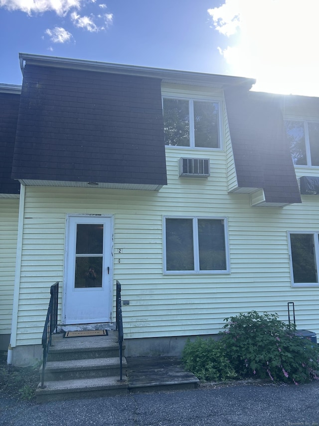 21 Oak Avenue Ext Unit 2, Torrington, CT 06790 - townhome / multi-family property with entry steps and a wall mounted air conditioner