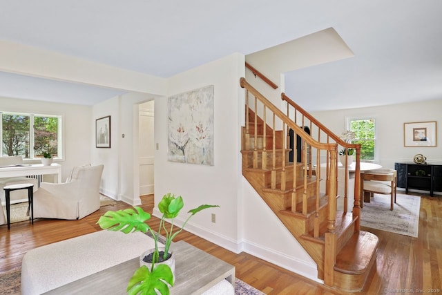 8 Bailey St, Trumbull, CT 06611 - staircase with wood finished floors and baseboards