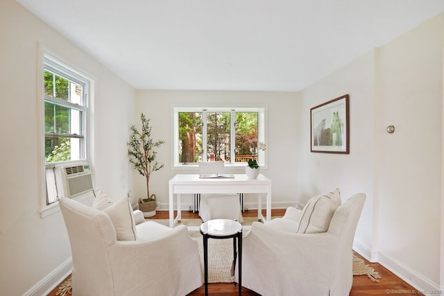 8 Bailey St, Trumbull, CT 06611 - living area with wood finished floors, cooling unit, and a desk