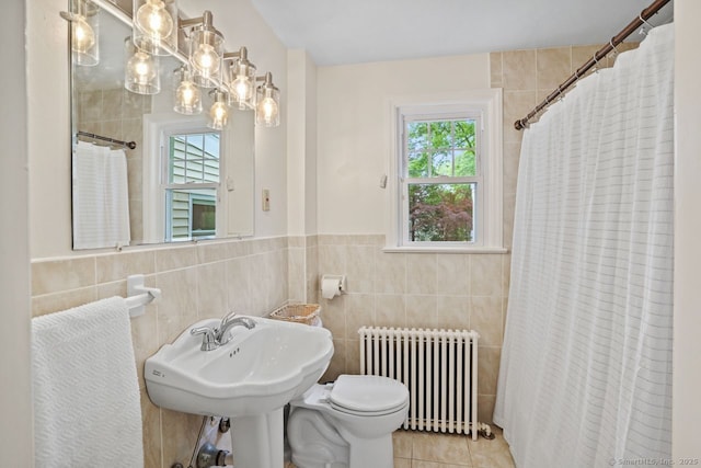 8 Bailey St, Trumbull, CT 06611 - full bathroom with radiator heating unit, tile walls, healthy amount of natural light, a shower with curtain, and a chandelier