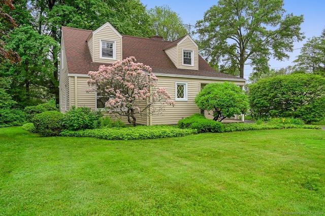 8 Bailey St, Trumbull, CT 06611 - view of side of property featuring a lawn and a chimney