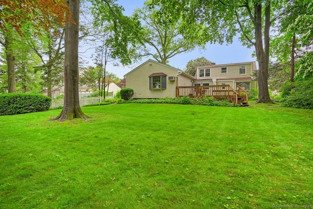8 Bailey St, Trumbull, CT 06611 - rear view of house with a deck and a lawn