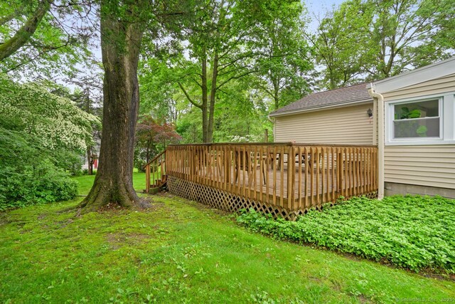 8 Bailey St, Trumbull, CT 06611 - view of green lawn with a wooden deck