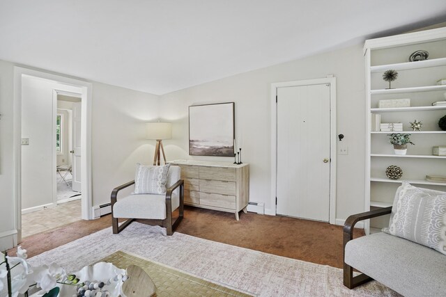 8 Bailey St, Trumbull, CT 06611 - living area featuring a baseboard heating unit and carpet