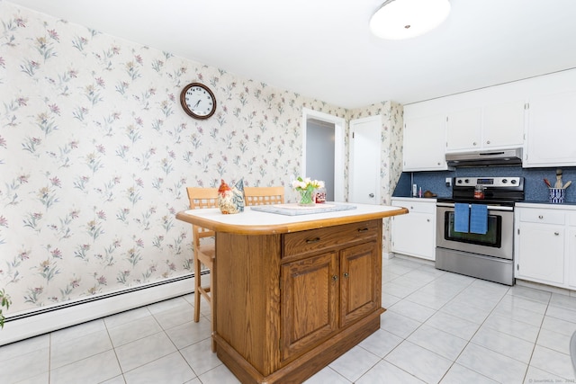 1 Meadowview Ln, Bloomfield, CT 06002 - kitchen with stainless steel electric range oven, a baseboard heating unit, wallpapered walls, under cabinet range hood, and light tile patterned flooring