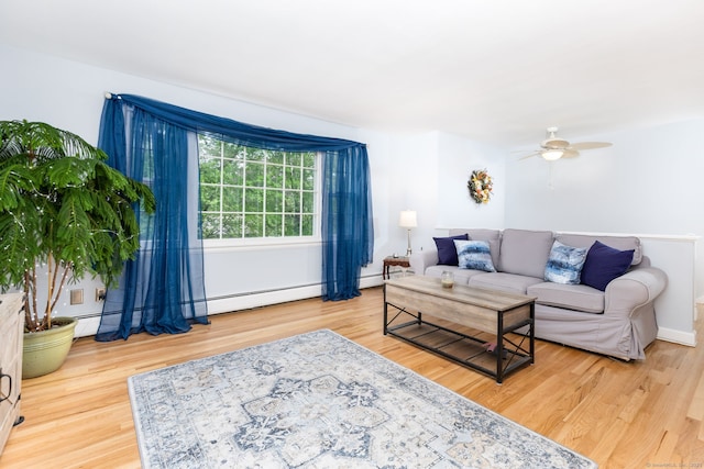 1 Meadowview Ln, Bloomfield, CT 06002 - living room with wood finished floors, a ceiling fan, and baseboards