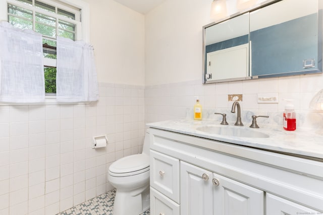 1 Meadowview Ln, Bloomfield, CT 06002 - bathroom with toilet, vanity, tile walls, and tile patterned floors