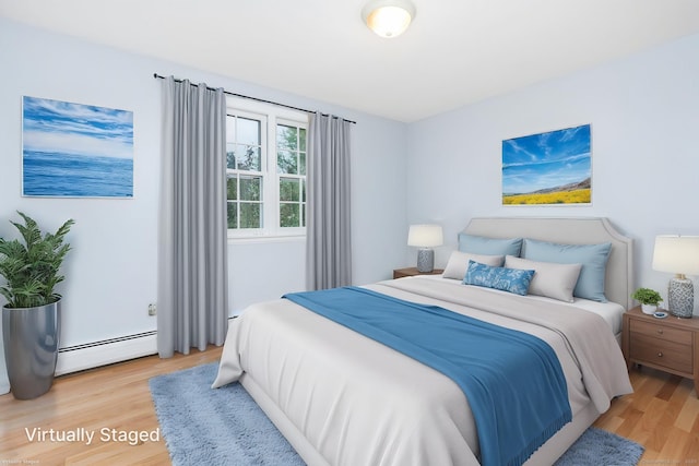 1 Meadowview Ln, Bloomfield, CT 06002 - bedroom with baseboard heating and light wood-style floors