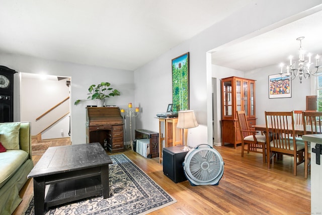 13 Bayberry Ln, Redding, CT 06896 - living room with wood finished floors, a chandelier, and stairs