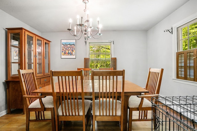 13 Bayberry Ln, Redding, CT 06896 - dining space featuring a chandelier, light wood-style flooring, and baseboards