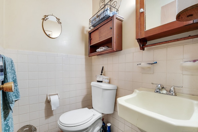 13 Bayberry Ln, Redding, CT 06896 - bathroom with a sink, tile walls, toilet, and a wainscoted wall