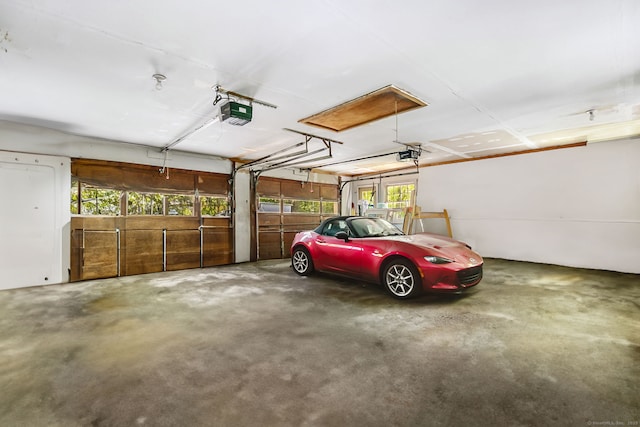 13 Bayberry Ln, Redding, CT 06896 - garage featuring a garage door opener