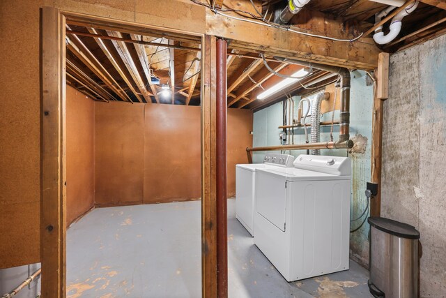 unfinished basement with washer and dryer