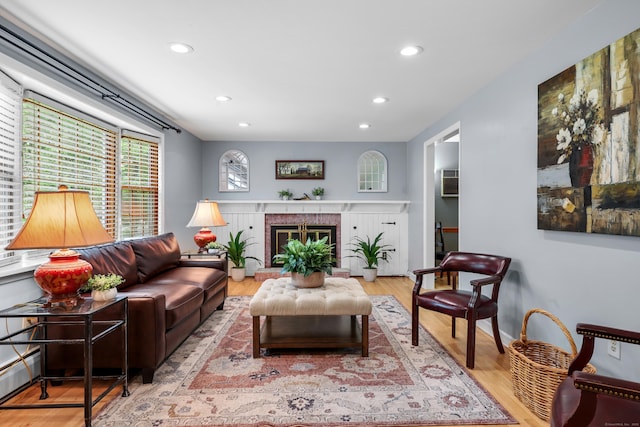 19 Crest Dr, Vernon, CT 06066 - living area featuring recessed lighting, wood finished floors, a fireplace, and a baseboard heating unit