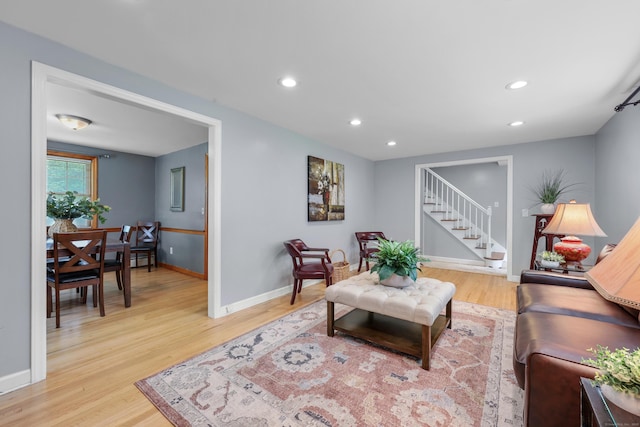 19 Crest Dr, Vernon, CT 06066 - living area featuring light wood finished floors, baseboards, recessed lighting, and stairs