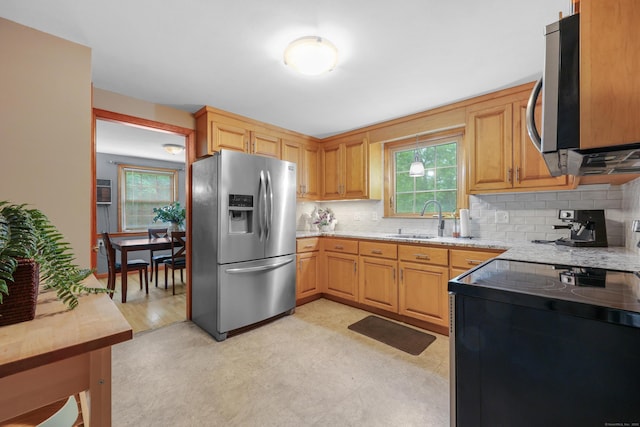 19 Crest Dr, Vernon, CT 06066 - kitchen featuring stainless steel appliances, a sink, backsplash, and healthy amount of natural light