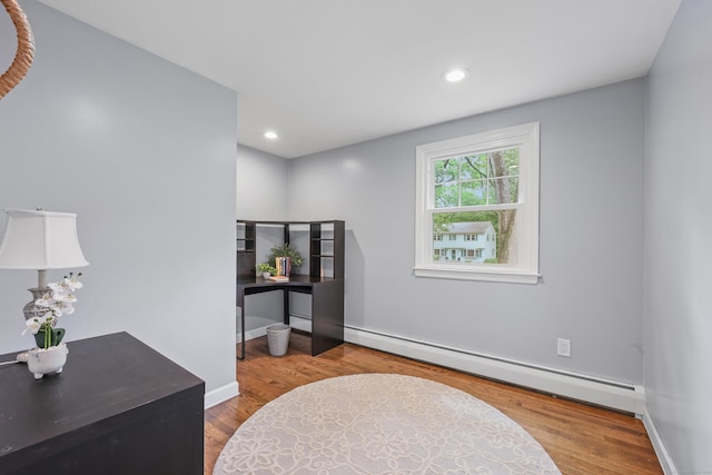 19 Crest Dr, Vernon, CT 06066 - living area with baseboard heating, wood finished floors, baseboards, and recessed lighting