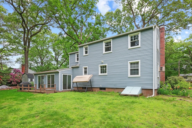 19 Crest Dr, Vernon, CT 06066 - rear view of house featuring a chimney, a yard, and a wooden deck