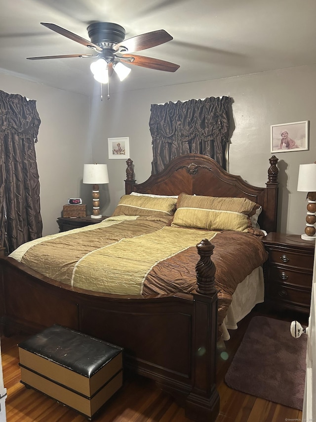 bedroom featuring wood finished floors and ceiling fan