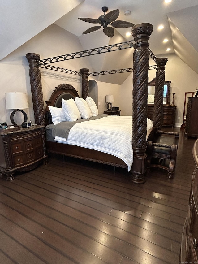 bedroom with lofted ceiling, dark wood-style flooring, and recessed lighting