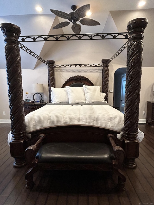 bedroom featuring wood finished floors, baseboards, and recessed lighting