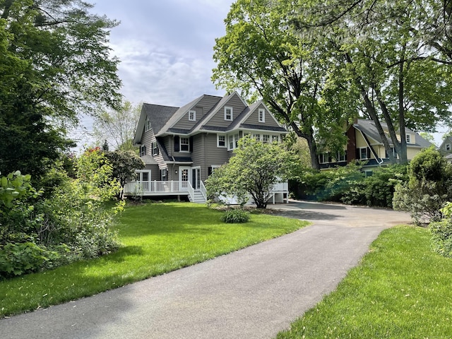 26 Ridgewood Rd, West Hartford, CT 06107 - shingle-style home with a front lawn, asphalt driveway, and a wooden deck