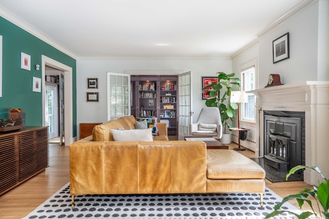26 Ridgewood Rd, West Hartford, CT 06107 - living room featuring crown molding, wood finished floors, and a fireplace