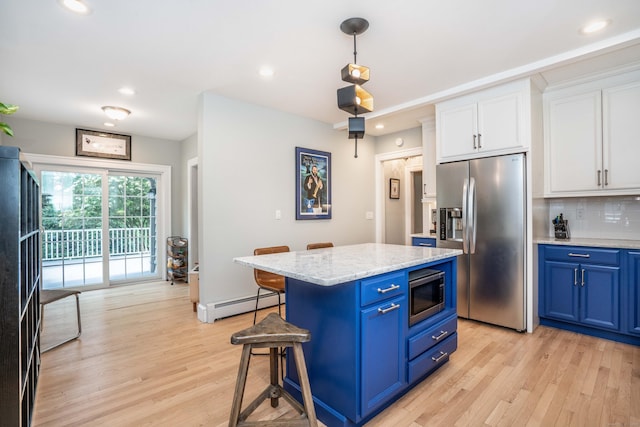 26 Ridgewood Rd, West Hartford, CT 06107 - kitchen featuring appliances with stainless steel finishes, a baseboard radiator, blue cabinetry, light wood-style flooring, and recessed lighting