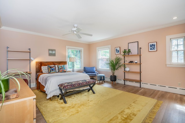 26 Ridgewood Rd, West Hartford, CT 06107 - bedroom with multiple windows, wood finished floors, baseboard heating, ornamental molding, and ceiling fan