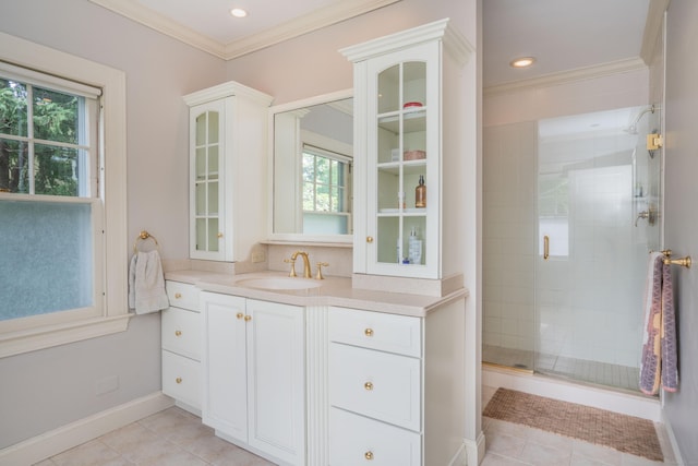 26 Ridgewood Rd, West Hartford, CT 06107 - full bath with tile patterned flooring, a stall shower, ornamental molding, vanity, and baseboards