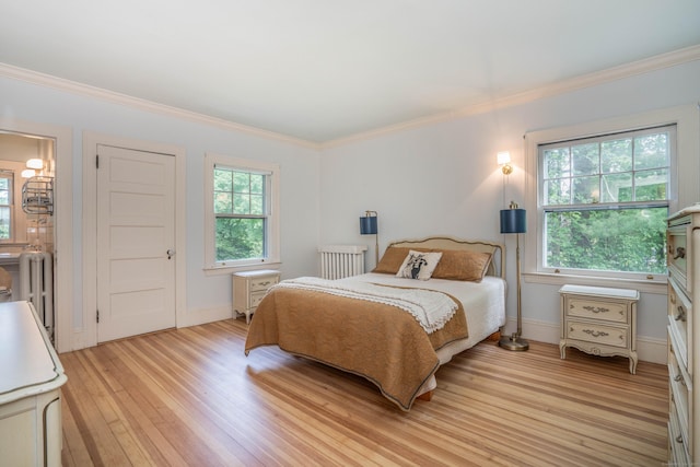 26 Ridgewood Rd, West Hartford, CT 06107 - bedroom featuring light wood-style floors, ornamental molding, and baseboards