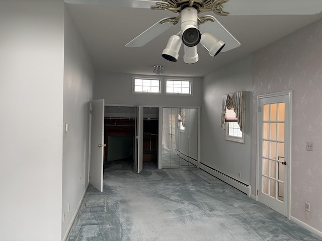156 Russell Ave, Orange, CT 06477 - interior space featuring carpet flooring, a ceiling fan, and a baseboard heating unit