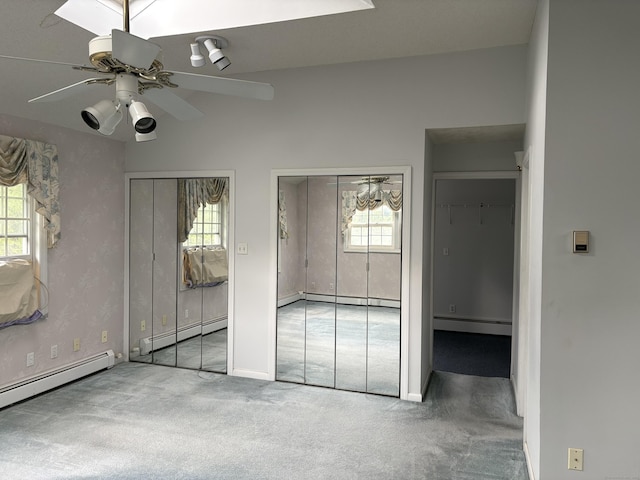 156 Russell Ave, Orange, CT 06477 - unfurnished bedroom with a baseboard heating unit, two closets, carpet floors, and baseboard heating