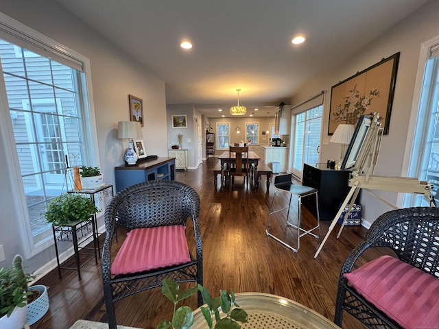 2636 Albany Ave, West Hartford, CT 06117 - living area with dark wood finished floors, recessed lighting, and baseboards