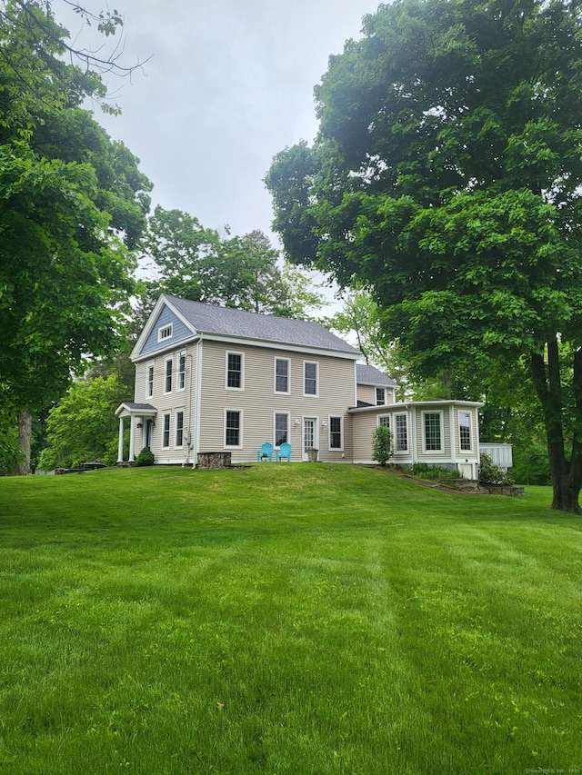 2636 Albany Ave, West Hartford, CT 06117 - back of house with a yard