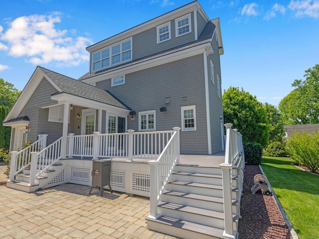 226 Alberta St, Fairfield, CT 06825 - rear view of property featuring a patio, roof with shingles, a wooden deck, stairs, and a yard