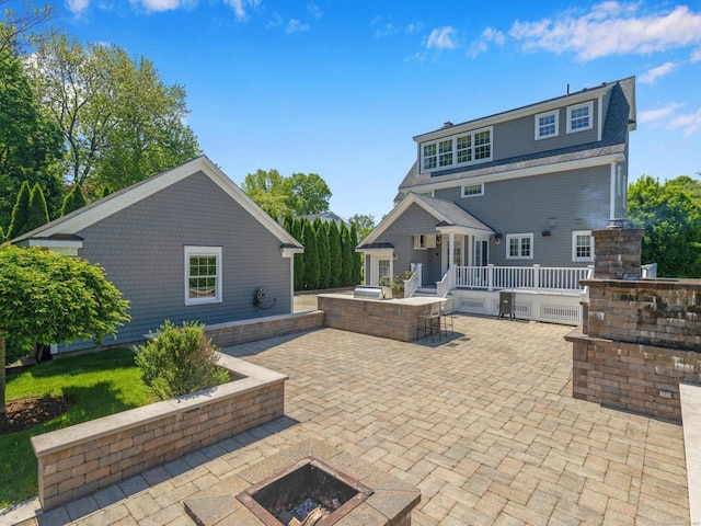 226 Alberta St, Fairfield, CT 06825 - back of house with a fire pit, a patio, area for grilling, and a wooden deck