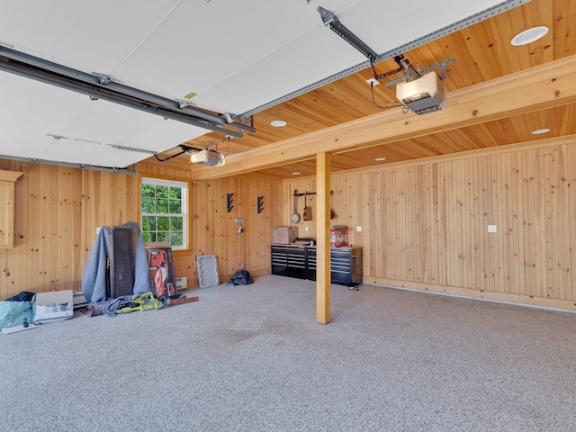 226 Alberta St, Fairfield, CT 06825 - garage with a garage door opener and wood walls