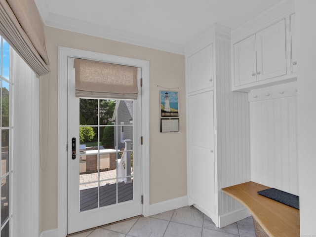 226 Alberta St, Fairfield, CT 06825 - mudroom with baseboards, light tile patterned floors, and ornamental molding