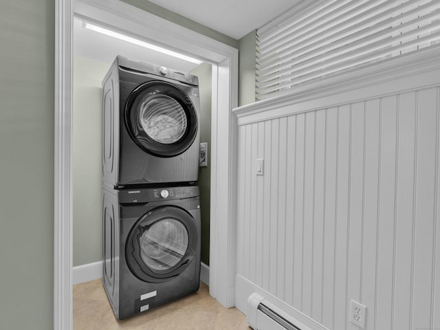 226 Alberta St, Fairfield, CT 06825 - clothes washing area with stacked washing machine and dryer and light tile patterned flooring