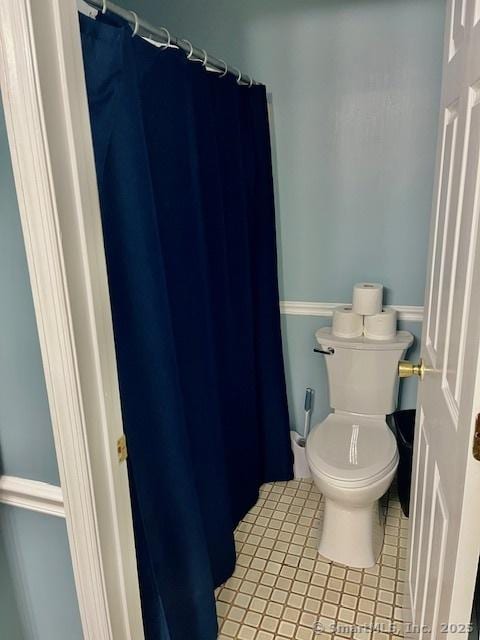 6 Hakim St Unit 2-6, Danbury, CT 06810 - bathroom featuring toilet, tile patterned floors, and curtained shower