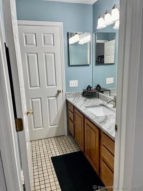 6 Hakim St Unit 2-6, Danbury, CT 06810 - bathroom featuring vanity and tile patterned floors