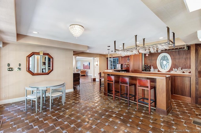 37 Hunting Hill Rd, Woodbridge, CT 06525 - kitchen with recessed lighting, baseboards, and a breakfast bar