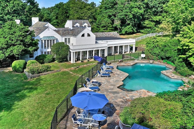 37 Hunting Hill Rd, Woodbridge, CT 06525 - rear view of property featuring a patio area and a chimney