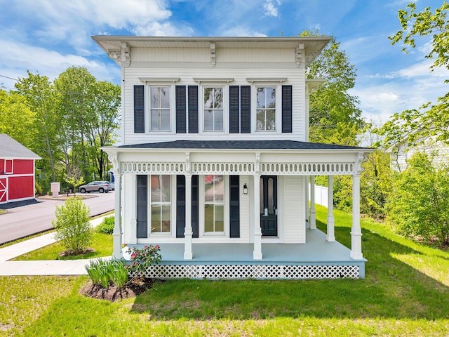 138 Boston Post Rd Unit 1, East Lyme, CT 06333 - back of property with covered porch and a lawn