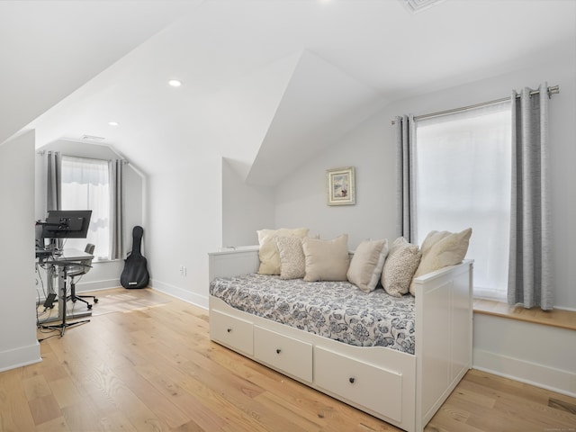 bedroom featuring vaulted ceiling, light wood finished floors, baseboards, and recessed lighting