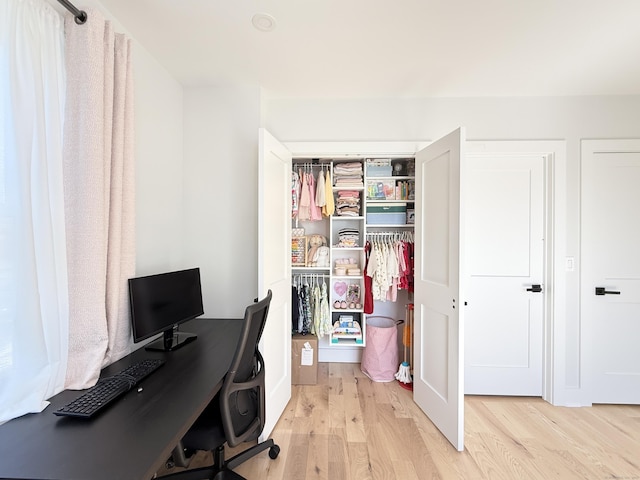 office space with wood finished floors