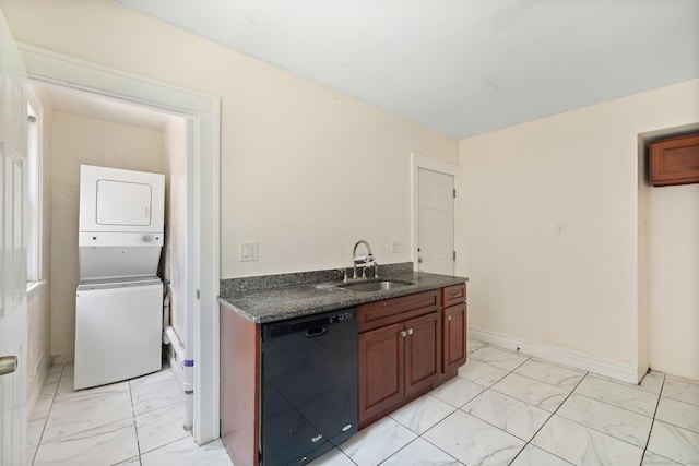 kitchen featuring black dishwasher, light marble finish floors, stacked washer / drying machine, a sink, and dark stone counters