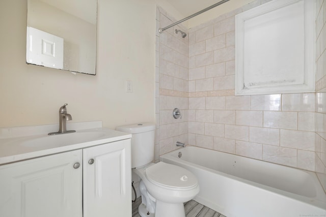 full bath with toilet, vanity, and bathing tub / shower combination